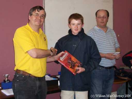 Robert receiving his prize