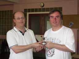 Lindon being presented with the Title Holder's trophy by Adrian Webb - click for more photos.